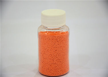 オレンジは洗浄力がある粉のナトリウム硫酸塩の基盤の多彩な斑点に斑点をつけます
